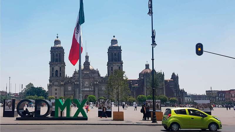 Mexico City: Historic Downtown Walking Tour - Standing near the ruins of the ancient Aztec city
