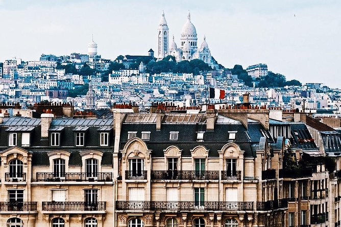 Montmartre District and Sacre Coeur - Exclusive Guided Walking Tour - Dalida stops and the music-memory details that make Montmartre fun