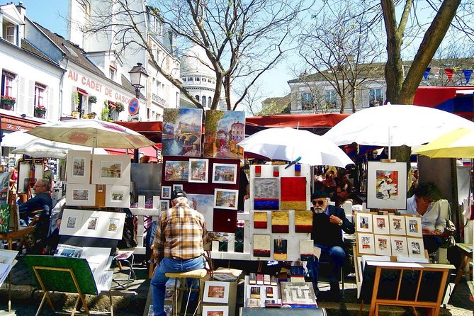 Montmartre District and Sacre Coeur - Exclusive Guided Walking Tour - Hidden Montmartre: wild garden slopes and a central vineyard