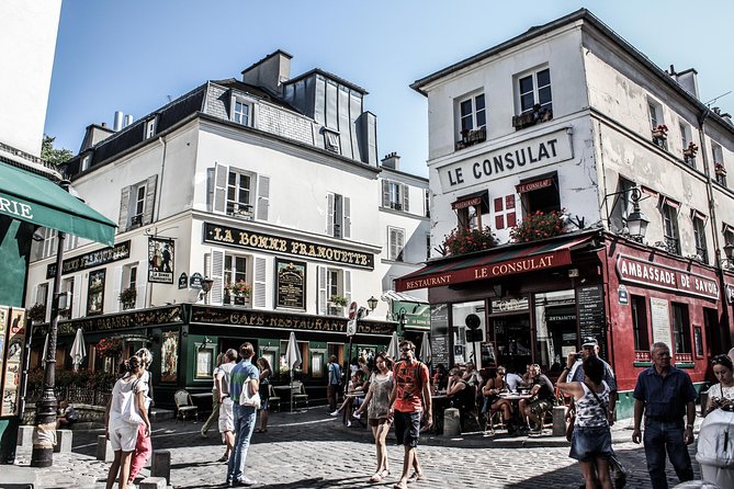 Montmartre District and Sacre Coeur - Exclusive Guided Walking Tour - Place des Abbesses: Art Nouveau flair near the finish