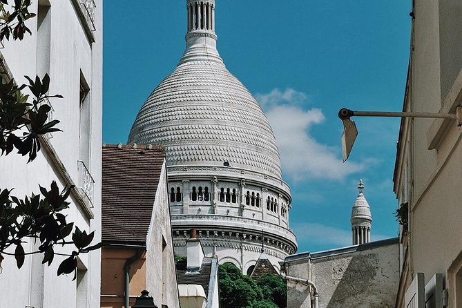 Montmartre District and Sacre Coeur - Exclusive Guided Walking Tour - Price and tickets: what’s included, what costs extra, and how to plan