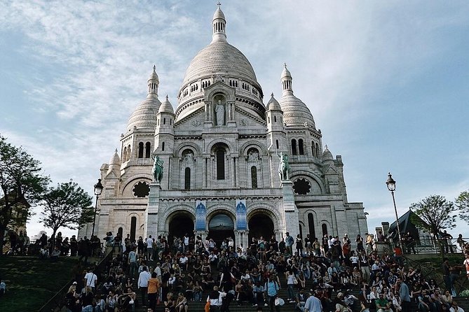 Montmartre District and Sacre Coeur - Exclusive Guided Walking Tour - Starting at Blanche: an easy way to begin the hill climb