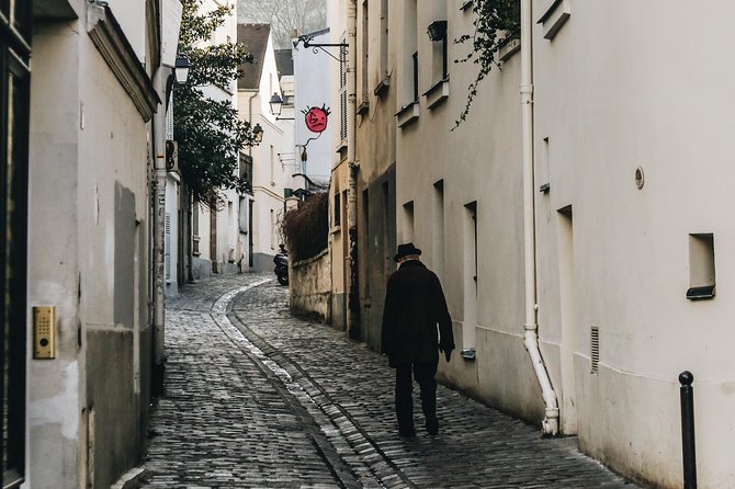 Montmartre District Walking Tour in Paris - Place Dalida and the Montmartre of identity and music