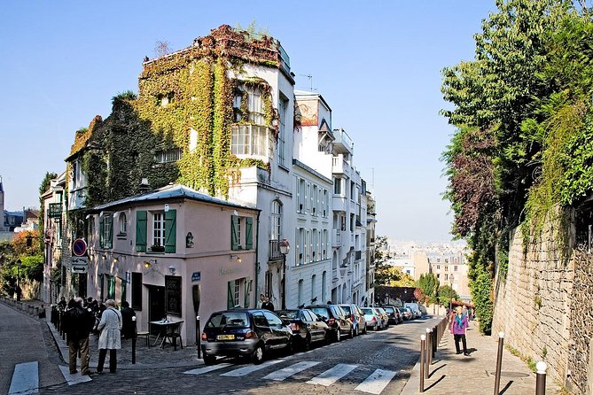Montmartre Hidden Gems and Scenic Highlights Walking Tour - Moulin de la Galette: The Windmill You’ve Seen in Paintings