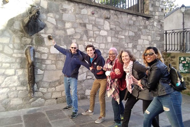 Montmartre Hidden Gems and Scenic Highlights Walking Tour - The Man Through a Wall and Dalida’s Bronze Bust