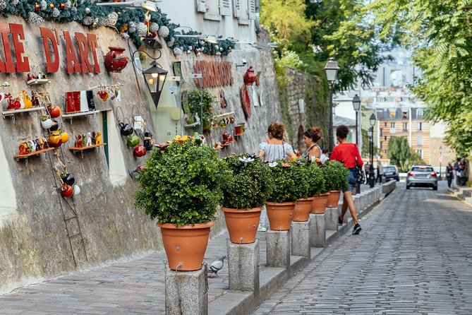 Montmartre Private Food Walking Tour With Locals: The 10 Tastings - Montmartre classics: quiche Lorraine and crêpe without the museum vibe