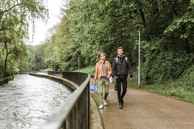 Munich Private Tour with a Local – Highlights & Hidden Gems - English Garden and the Eisbach wave: a 900-acre reset