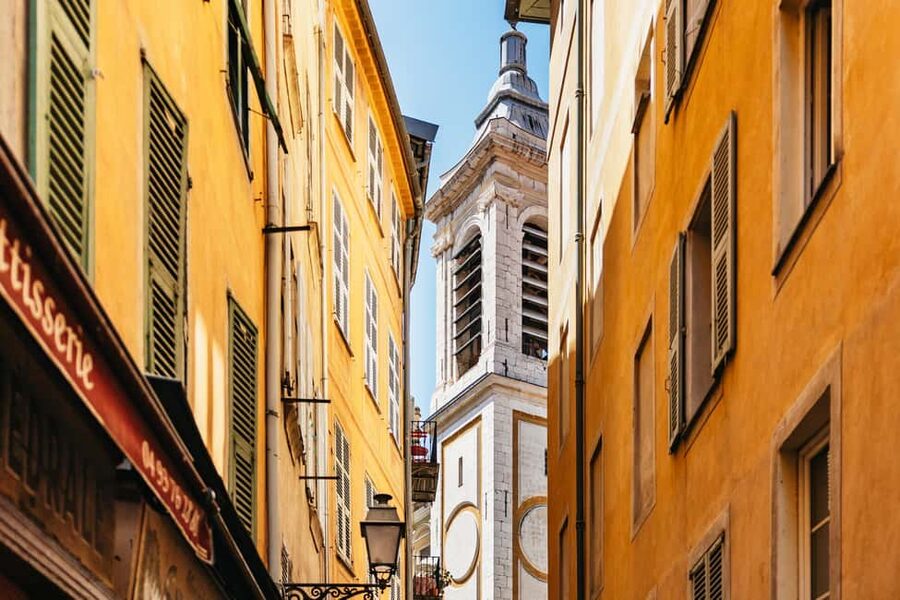 Nice: Old Town & Castle Hill Informative Guided Walking Tour - Vieux Nice side streets: cobblestones, shops, churches, and built-in photo moments