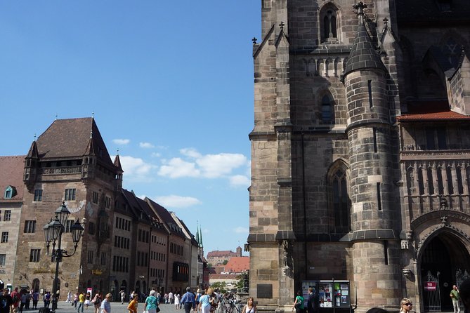 Nuremberg Old Town and Nazi Party Rally Grounds Walking Tour in English - Nuremberg’s main sights: churches, fountains, town hall, and the Dürer connection