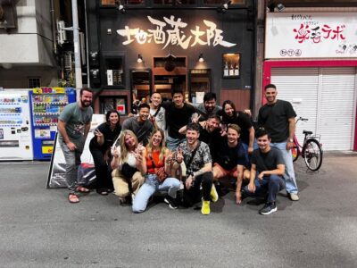 Osaka: Izakaya Bars Guided Walking Tour - Dotonbori walk: temples, side alleys, and learning the street logic