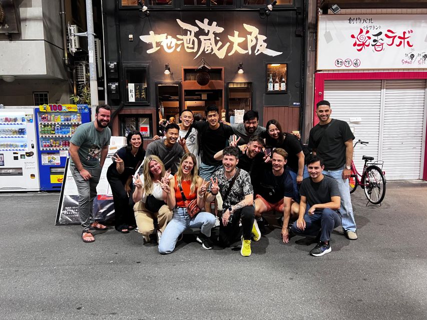 Osaka: Izakaya Bars Guided Walking Tour - Dotonbori walk: temples, side alleys, and learning the street logic