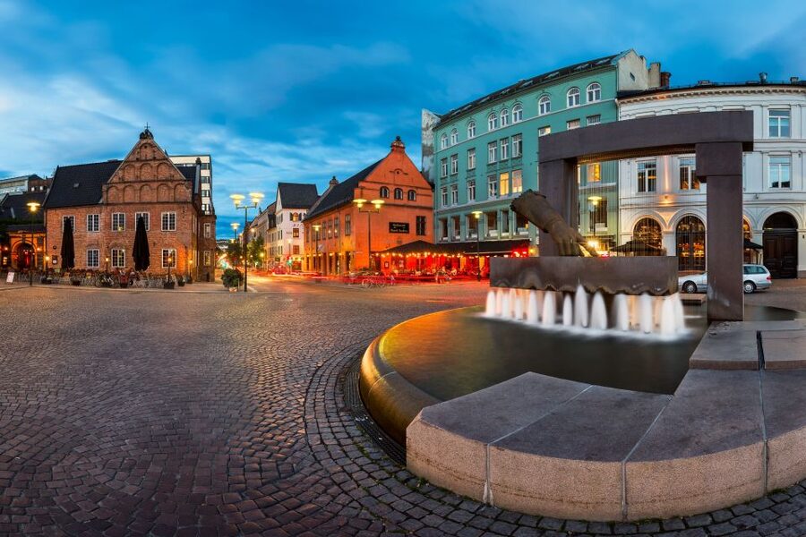 Oslo: Historic Myths & Legends Evening Walking Tour - Christiania Torv: a historic square where Oslo’s story keeps moving