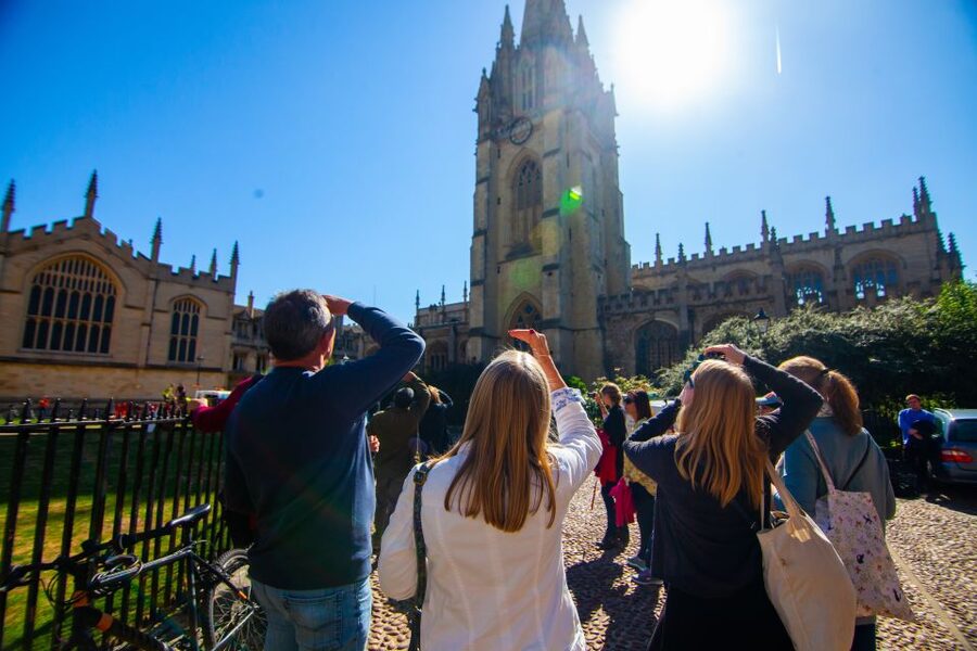 Oxford: University and City Walking Tour with Alumni Guide - Town stories on the move: ceremonies, famous graduates, Alice, and a dark Oxford episode