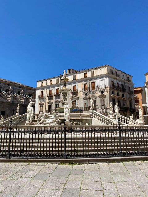 Palermo: Markets and Monuments City Center Walking Tour - Palazzo Pretorio and Fontana Pretoria: the story behind the nudity