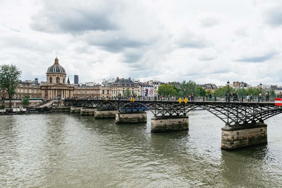 Paris: Emily TV Show Locations Guided Walking Tour - Where to meet: Place de lEstrapade and that orange sign