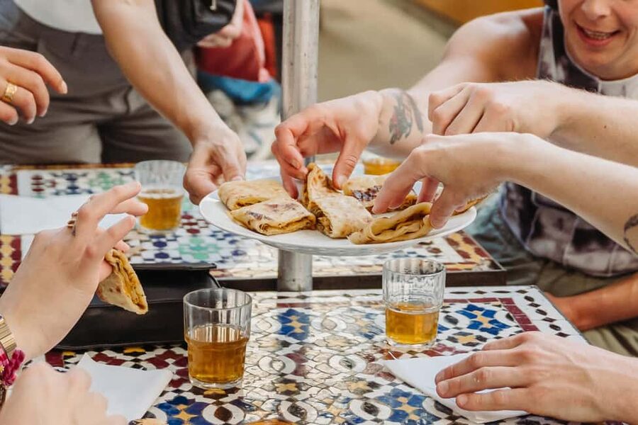 Paris: Food and Wine Tasting Walking Tour in Le Marais - Covered-Market Snacks: Moroccan Crepes and a Side of History