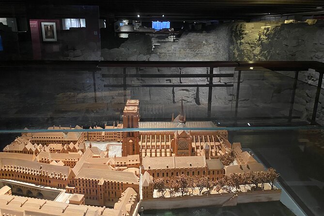 Paris: Île de la Cité and Notre-Dame Walking Tour With Crypt - Place Dauphine, Tour de l’Horloge, and the Conciergerie: design + power