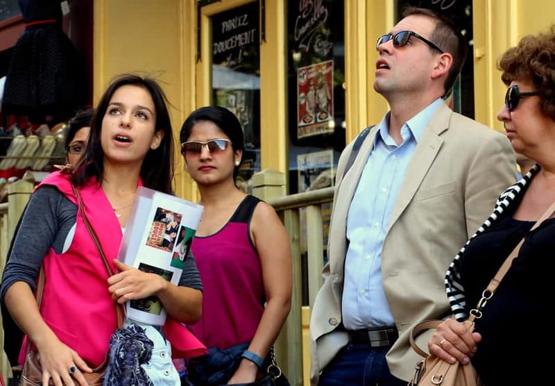Paris: Montmartre Guided Walking Tour - How the walk starts at Place Blanche and why timing matters