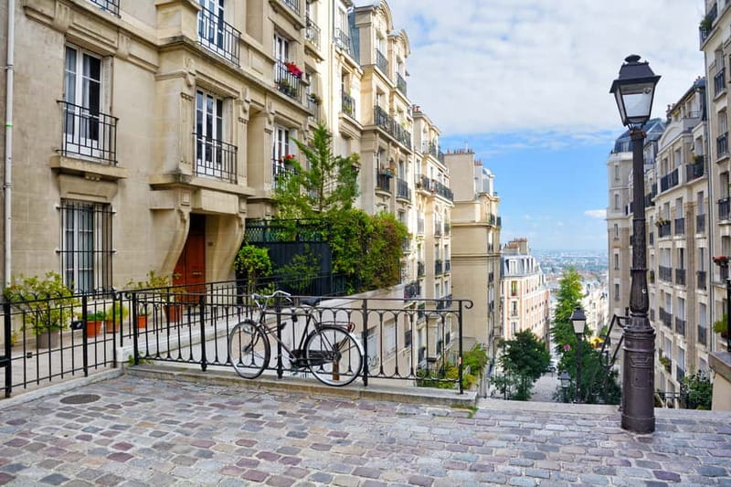 Paris: Montmartre Hidden Gems and Highlights Walking Tour - Moulin de la Galette: The Landmark and the Artistic Connection
