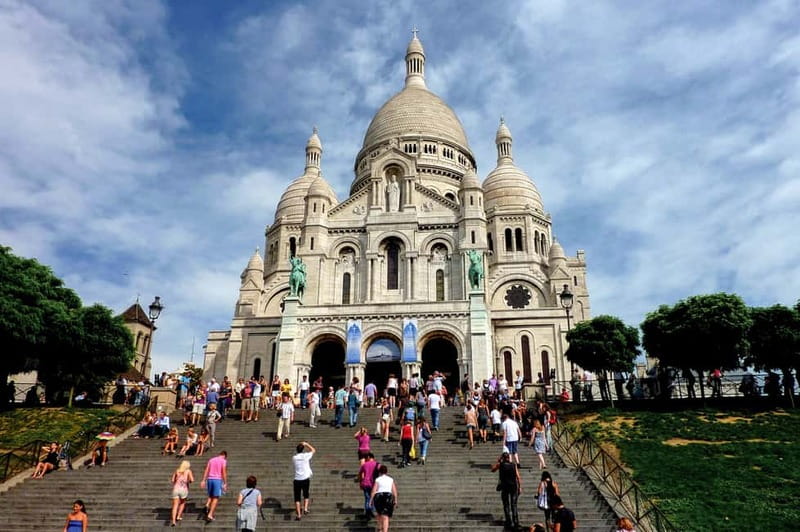Paris: Montmartre Hidden Gems and Highlights Walking Tour - Sacré-Cœur Hilltop Views Without the Long Detour