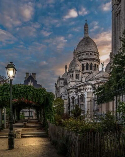 Paris: Montmartre Highlights Walking Tour with a Local Guide - Starting under Sacré-Cœur: Place Saint-Pierre and the view that sets the mood