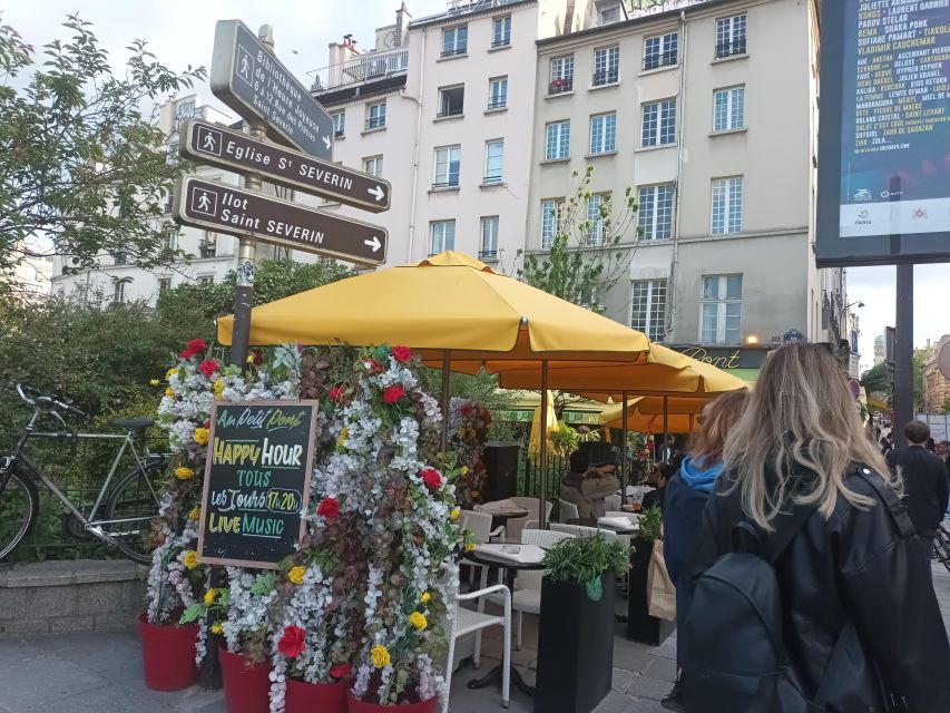 Paris: Notre Dame Exterior Walking Tour with Sainte Chapelle - Place Dauphine and Henry IV: a smaller square with a big backstory
