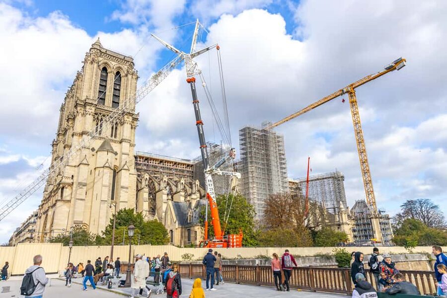 Paris: Walking Tour with Notre Dame or Ste-Chapelle Access - Place Dauphine: the calm square that explains a lot