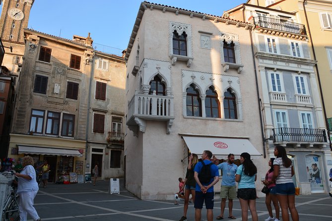 Piran Walking Tour with Local Wine and Food Tasting - First of May Square: history, then a local food-and-wine finale