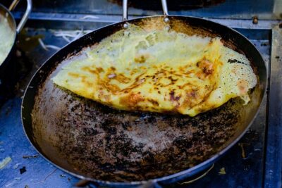 Private Street Food Evening Walking Tour in Ho Chi Minh City - Stop One: rice pancakes and veggie-heavy comfort