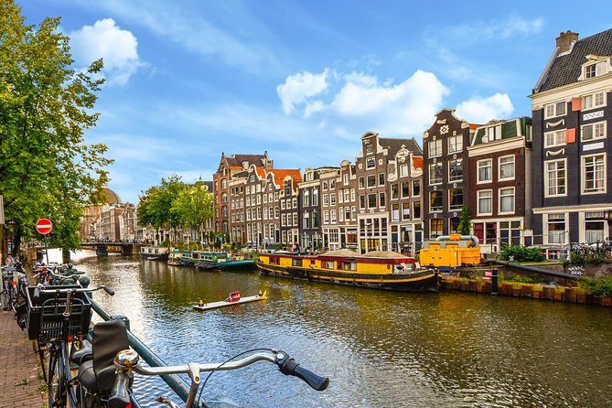 Private Tour: Amsterdam City Walking Tour and Canal Cruise - A Dam Square start that helps you understand Amsterdam fast