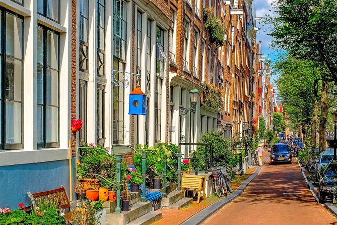 Private Tour: Amsterdam City Walking Tour and Canal Cruise - Guide quality: tailoring your pace and interests in plain English