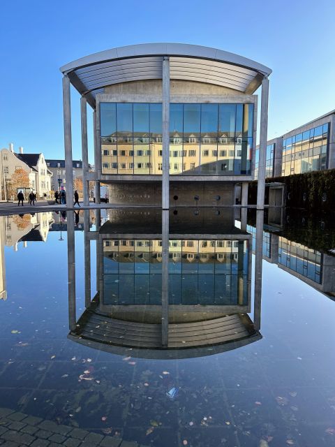 Reykjavik: City Walking tour in Small Group with Local Guide - Harpa Concert Hall Inside: Warm Stop Meets Jaw-Dropping Design