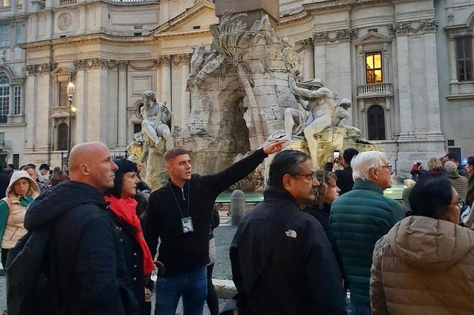 Rome: Guided Small Group Walking Tour of City Highlights - Trajan’s Column for a fast lesson in imperial storytelling