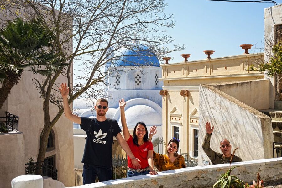 Santorini: Sunset Walking Tour with Local Food and Drinks - Three-spirits tasting and Greek drinking customs after dark