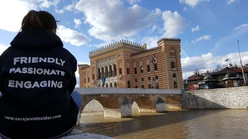 Sarajevo: Grand Walking Tour Through Time and Cultures - City Hall, a view point, and the House of Spite’s oddball legend
