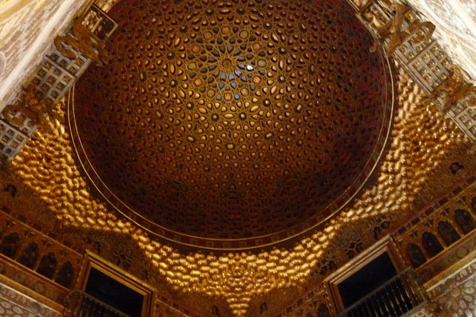 Seville Private Walking Tour with Alcazar & Cathedral Tickets - Royal Alcázar: Moorish palace energy and royal calm