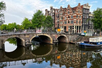 Small Group Walking Tour in Amsterdam with Friendly and Fun Guide - Dam Square and Damstraat: How a Fishing Village Became Amsterdam