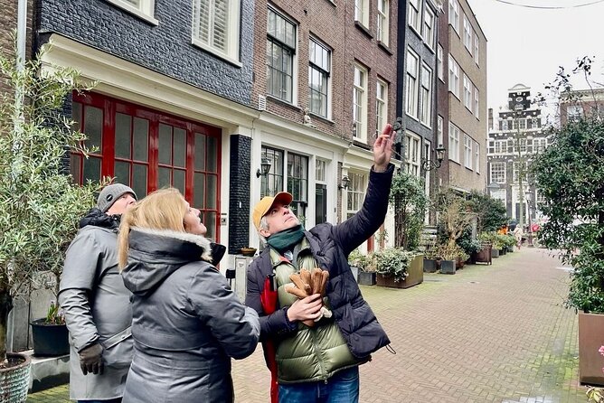 Small Group Walking Tour in Amsterdam with Friendly and Fun Guide - Old Center from the Waag to Dam Square: Stories Between the Sights