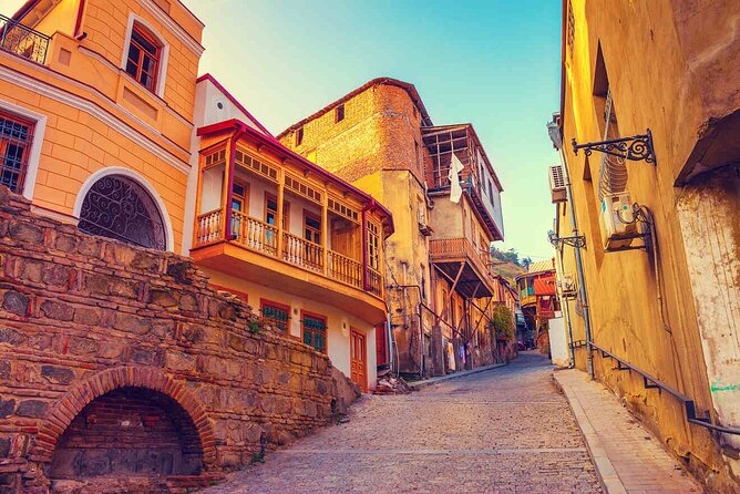 Tbilisi:Evening Walking & Talking Tour with Wine & Boat Ride - Stop-by-stop: the route that connects Tbilisi’s eras