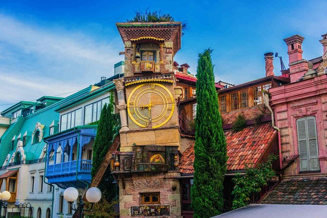 Tbilisi:Evening Walking & Talking Tour with Wine & Boat Ride - The clock angel and the heart of old Tbilisi