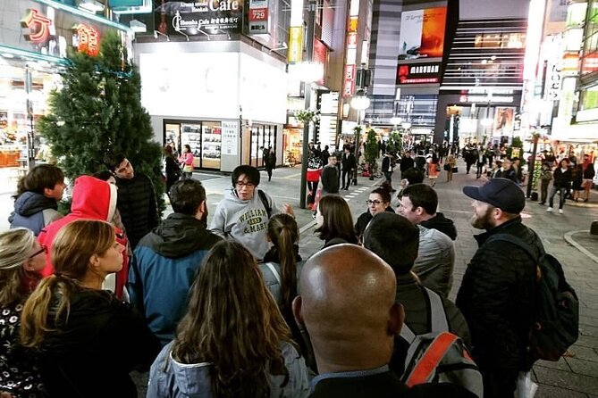 The Dark Side of Tokyo - Night Walking Tour Shinjuku Kabukicho - Godzilla Head: a pop-culture stop that breaks the tension