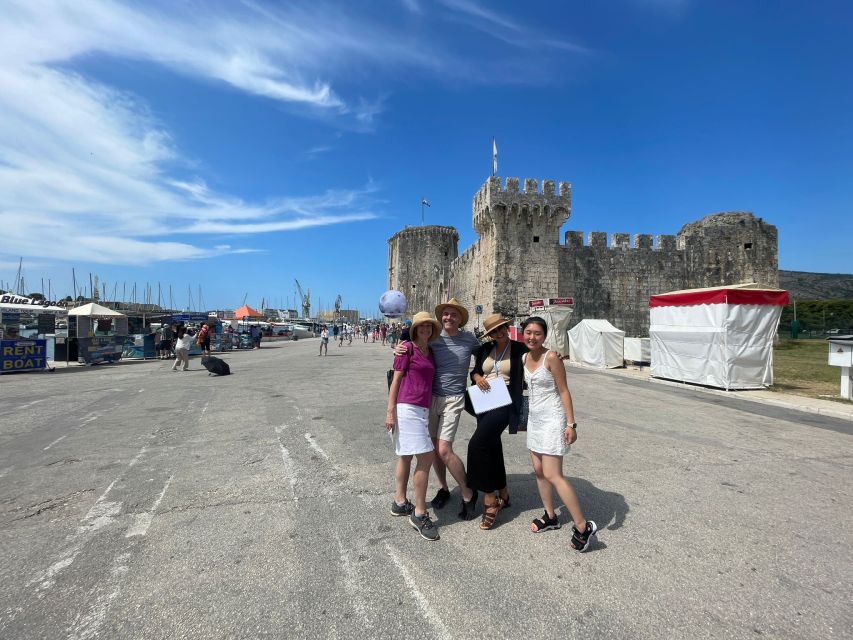 Trogir: City Highlights Guided Walking Tour - Walking the Promenade: palms, sea air, and coffee in real life