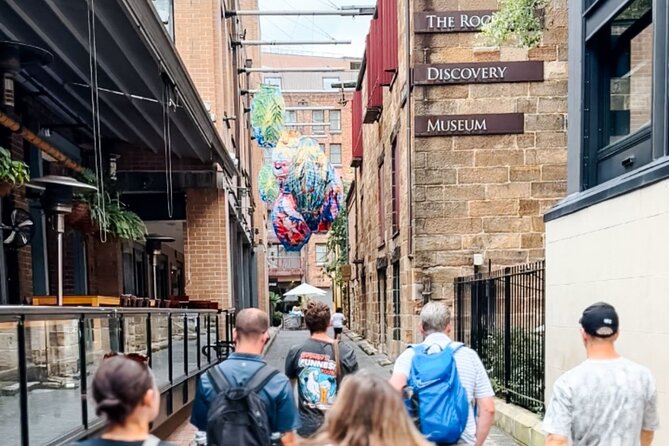 Ultimate Sydney Walking Tour (Small-Group, Drink Included) - The Rocks walk: getting specific with Nurses Walk, Jack Mundey Place, and lower George Street