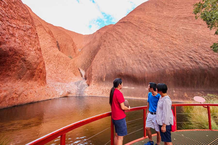 Uluru: Guided Walking Tour at Sunrise with Light Breakfast - Mutitjulu Waterhole: Where the Art Gets Real