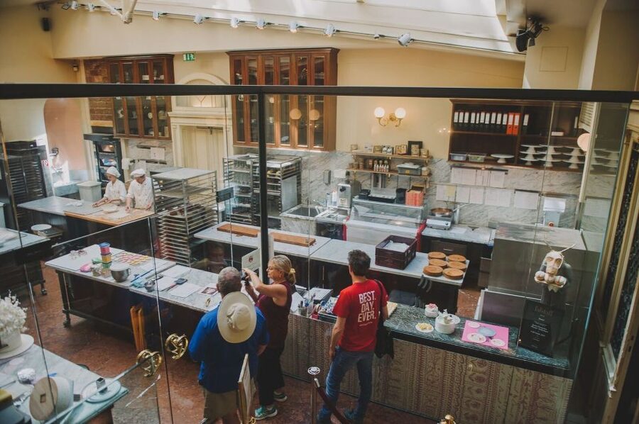 Vienna: Guided Foodie Walking Tour with Tastings and Coffee - Guides make it land: humor, local stories, and named stops