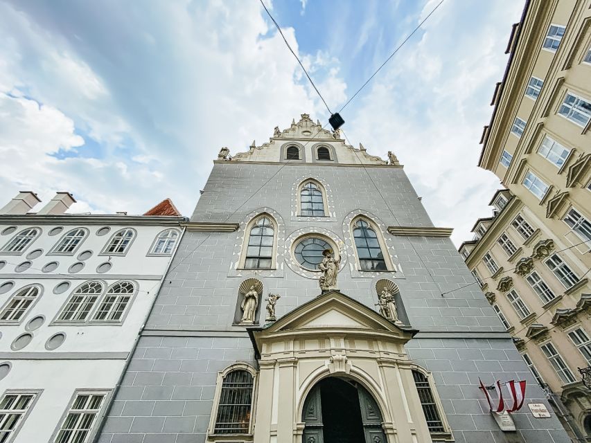 Vienna: Hidden Secrets and Local Stories Walking Tour - Small-Group Walking: From Humor to Rain Plans