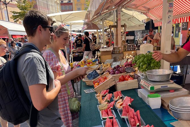 Walking tour of Nice, the old town & the Coline du Château - Stop 4: Vieux Nice (Old Town) lanes, pastel facades, and food smells